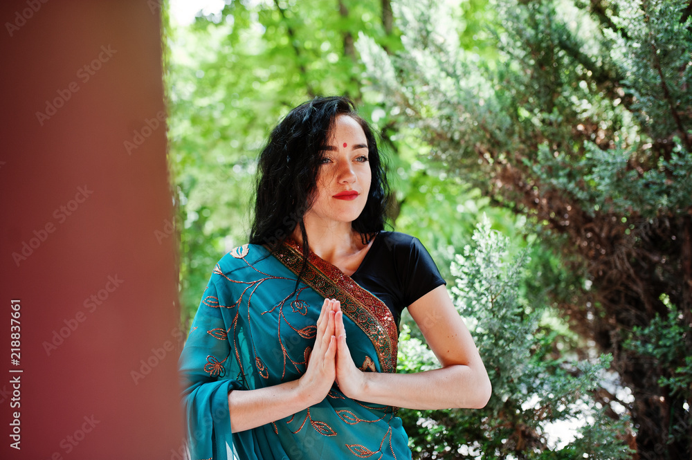 Portrait of beautiful indian brumette girl or hindu woman model. Traditional Indian costume lehenga choli. Portrait of beautiful indian brumette girl or hindu woman model. Traditional Indian costume lehenga choli.