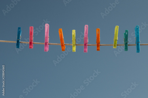 multi-colored clothespins for drying clothes