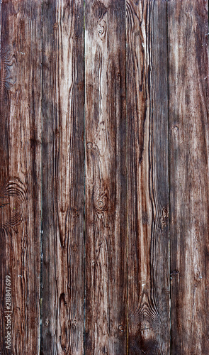 A fence of vertical dark turquoise boards. Blank background with a texture of wooden slats 