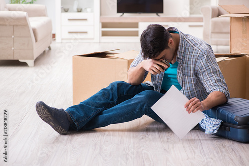 Unemployed man receiving foreclosure notice letter © Elnur