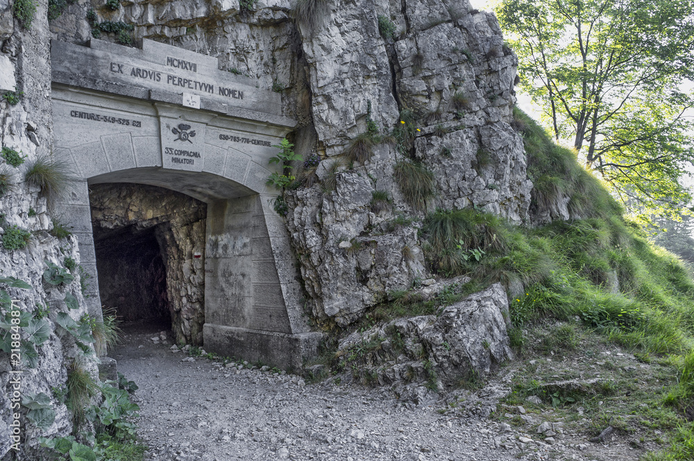 Naklejka premium the first tunnel on the Road of 52 galleries, Veneto, Italy / Strada delle 52 gallerie (Road of 52 galleries) is a military trail built during World War I on the massif of Pasubio (Vicenza, Italy)