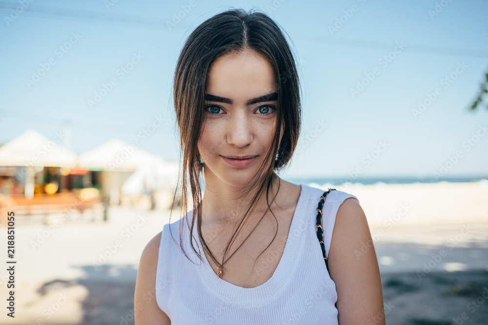 Beautiful teen girl enjoying summer day looking at camera Beautiful teen girl enjoying summer day looking at camera