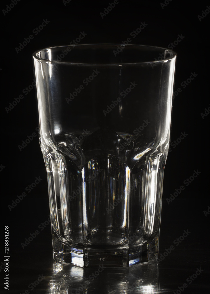 Empty glass on a black background close-up Empty glass on a black background close-up