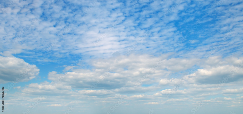Light clouds in the blue sky. Wide photo. Light clouds in the blue sky. Wide photo.