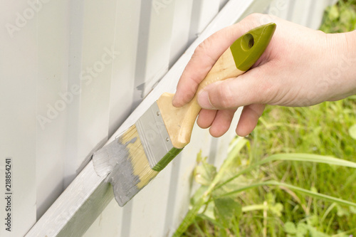 fence repair in paint and paint