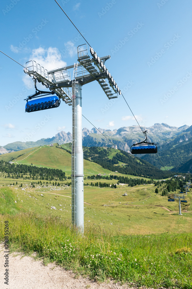 Cable raleway near mountain Langkofel heading down the valley