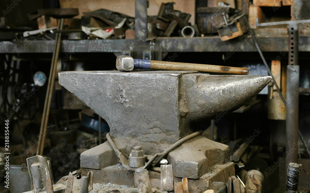 Hammer on anvil in the blacksmith's shop.