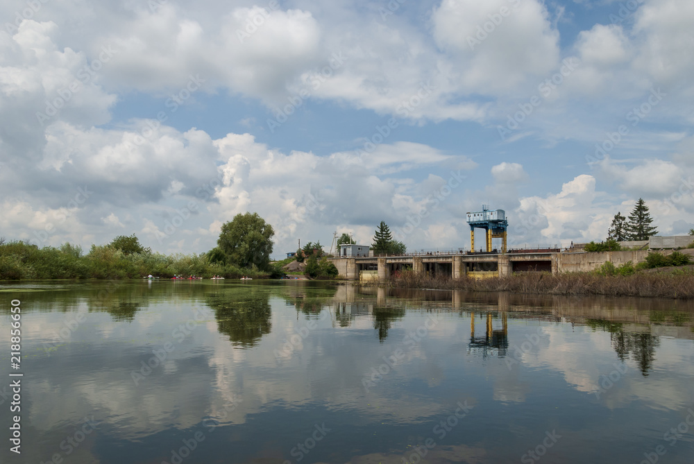 River with blue sky and clouds in summer day River with blue sky and clouds in summer day