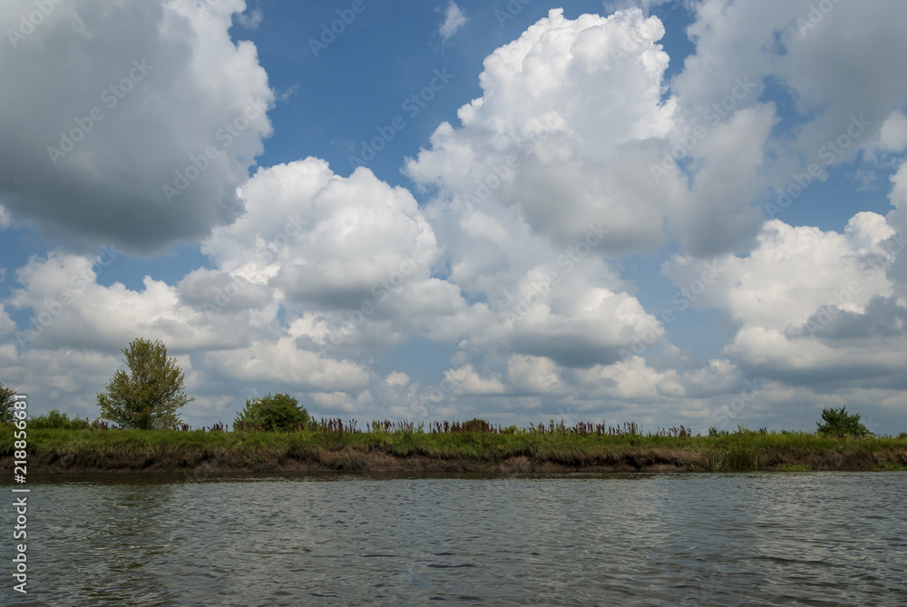 River with blue sky and clouds  in summer day