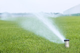 Watering a football field with automatic control