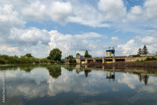 River with blue sky and clouds  in summer day © Stepan