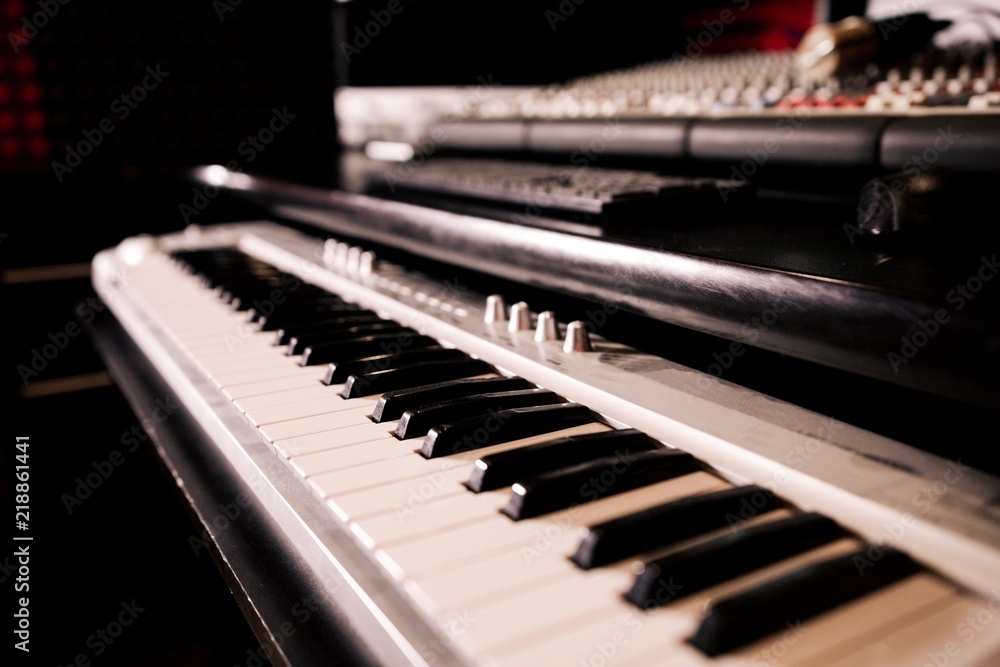 Musical synth close-up on dark background Musical synth close-up on dark background
