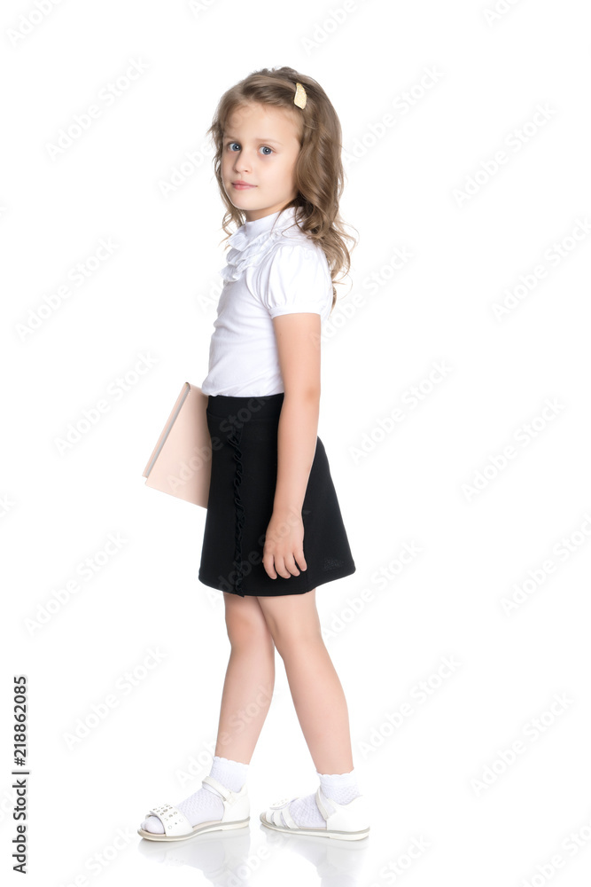 Fototapeta premium Little girl with a book
