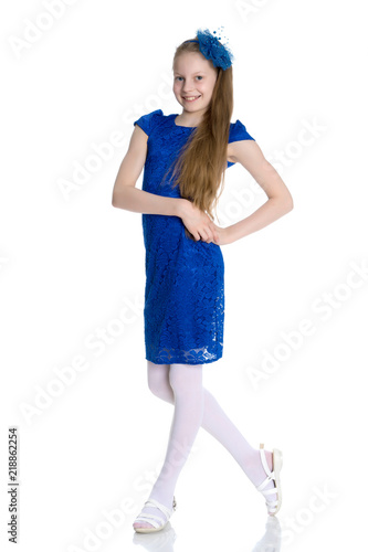 Elegant girl in a dress.