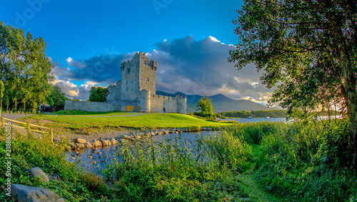 Idyllic landscape of Ross Castle in the Killarney National Park in Ireland. Travel by car through the Ring of Kerry. photo