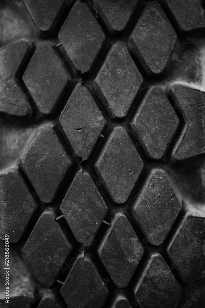 Black tires with a protector from old military equipment close-up Black tires with a protector from old military equipment close-up