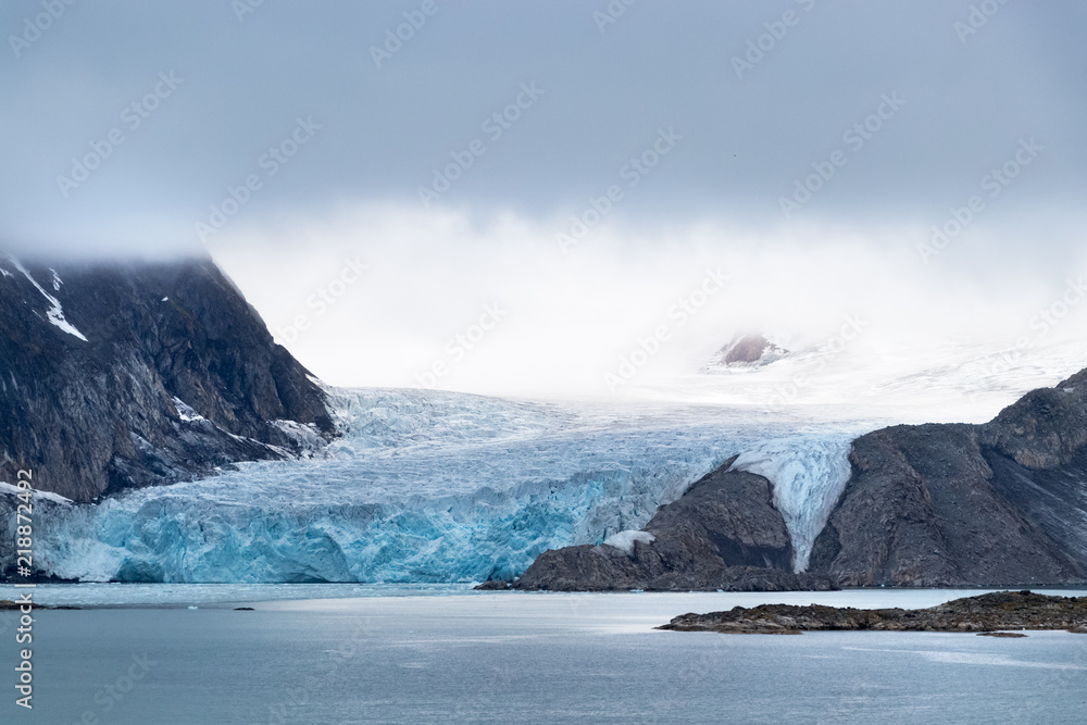 Glacier Raudfjord, Spitsbergen island, Svalbard, Norway at summer. Glacier Raudfjord, Spitsbergen island, Svalbard, Norway at summer.
