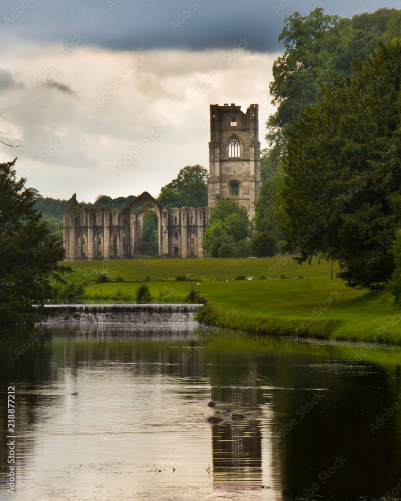 Fountains Abbey Vertical image with reflection in pond