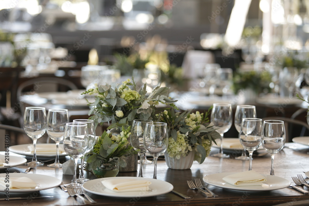elegant Table decoration with wine glasses, glasses, forks, ornaments, ready to serve in event, wedding, celebration, xv years, baptism elegant Table decoration with wine glasses, glasses, forks, ornaments, ready to serve in event, wedding, celebration, xv years, baptism