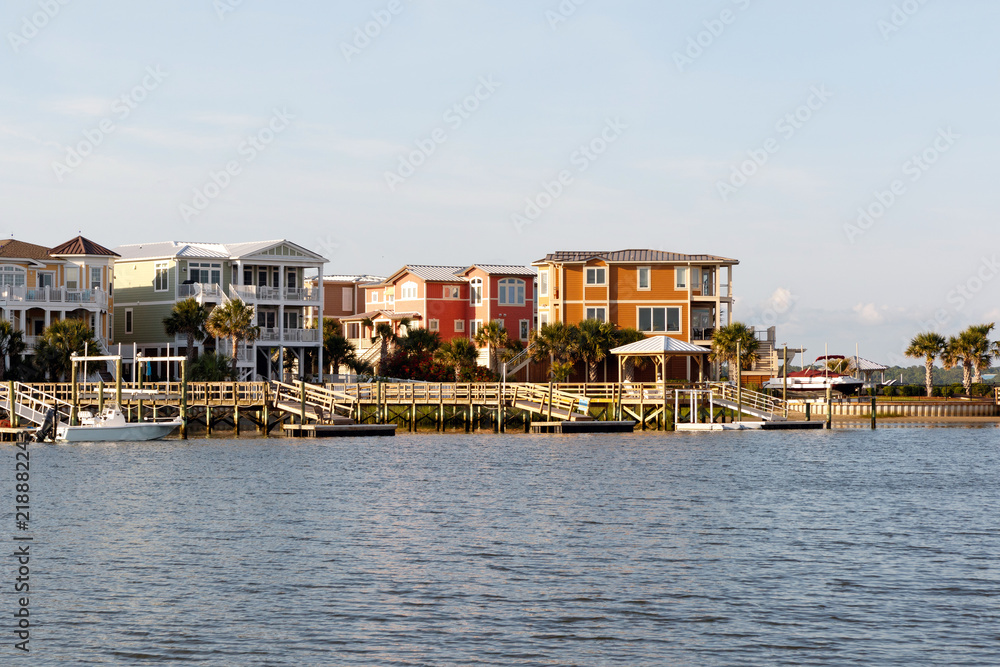 Wide angle view of Luxury beach houses with boat dock on the inter coastal waterway, Sunset Beach, North Carolina 