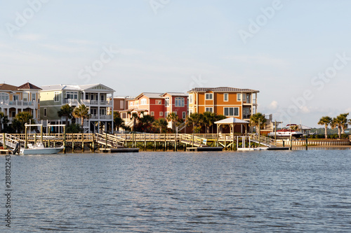 Wide angle view of Luxury beach houses with boat dock on the inter coastal waterway, Sunset Beach, North Carolina 