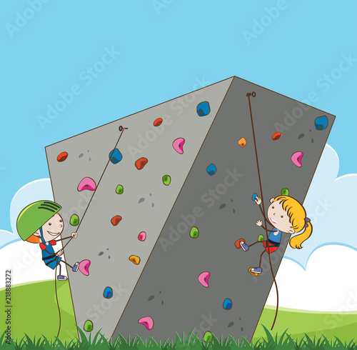 Children doing outdoor rock climbing