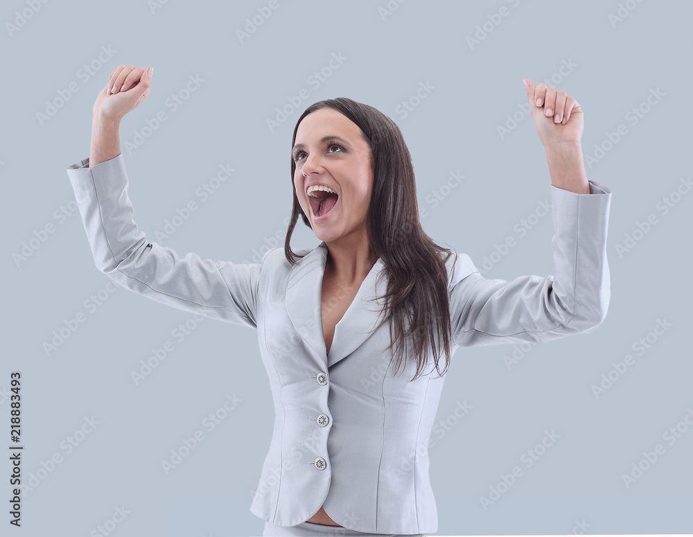 Portrait of  happy excited business woman raising hand on white 
