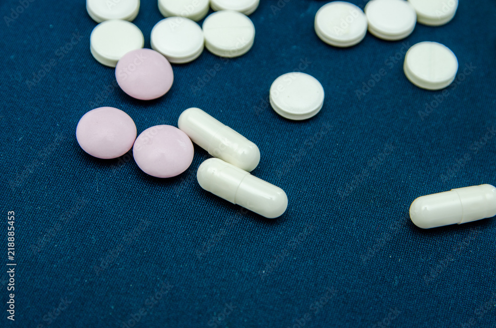 tablets are scattered on the table, dosage for the patient tablets are scattered on the table, dosage for the patient