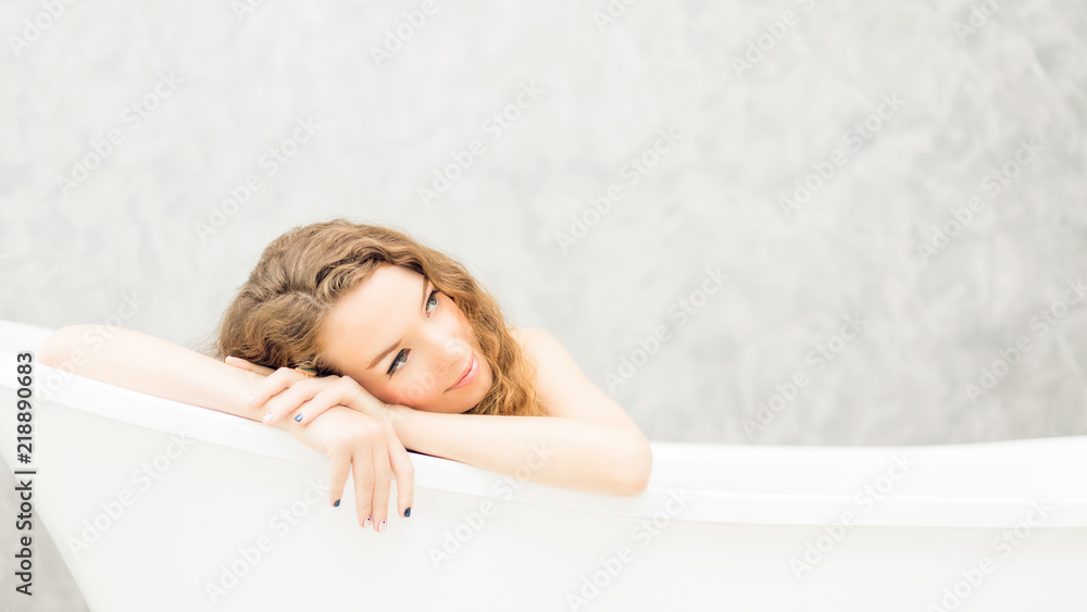 Young woman relaxing in bath.beautiful woman lying in bathtub. Young woman relaxing in bath.beautiful woman lying in bathtub.