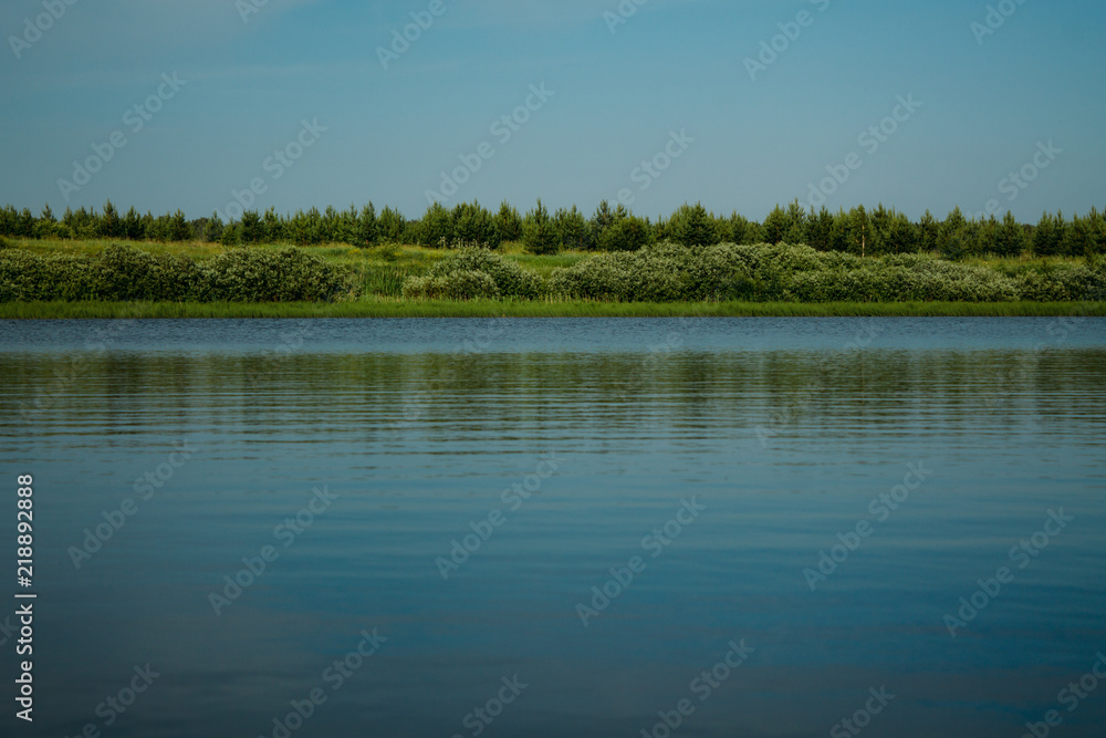 Clear lake with reflection in water Clear lake with reflection in water