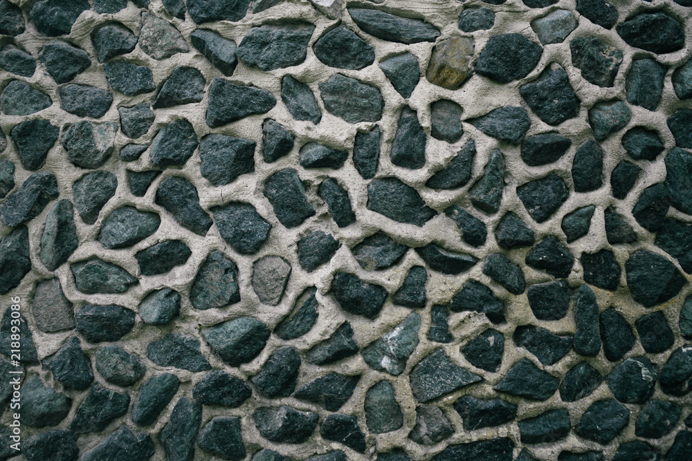 A wall of uneven stones A wall of uneven stones