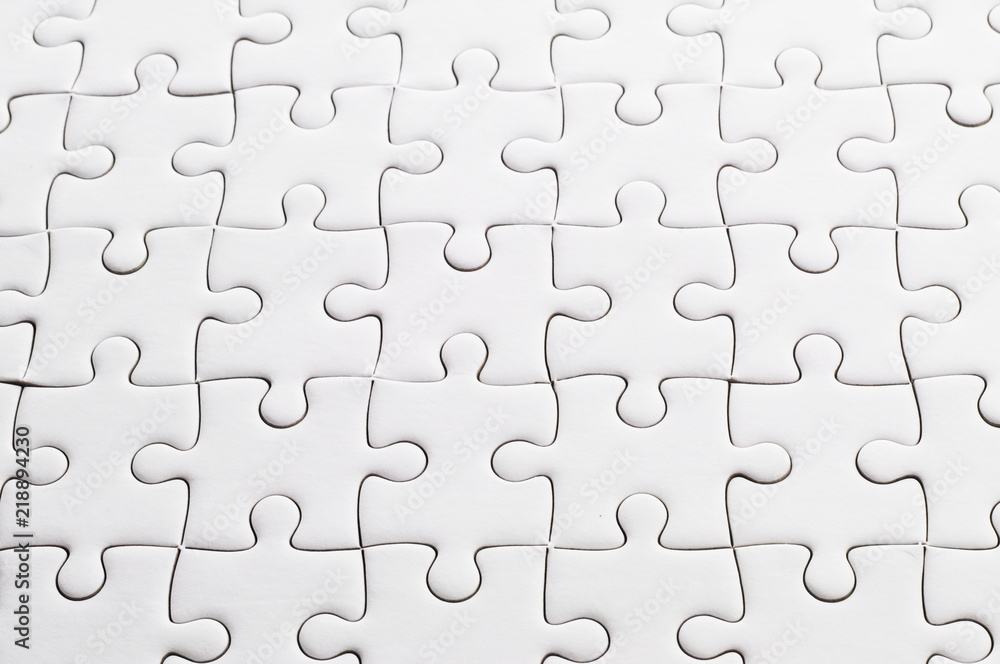close up white jigsaw puzzle close up white jigsaw puzzle