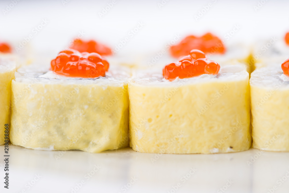 Sushi set and composition at white background. Japanese food restaurant, sushi maki gunkan roll plate or platter set. Sushi set and composition at white background. Japanese food restaurant, sushi maki gunkan roll plate or platter set.