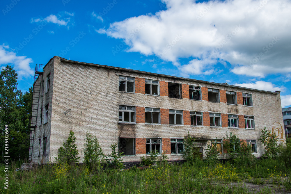 Old, destroyed, abandoned houses and buildings, broken Windows and doors