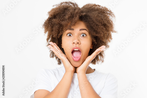 Happy suprised face. Young dark skin woman isolated on white background. African american girl. Copy space. Mock up. Afro curly hair.