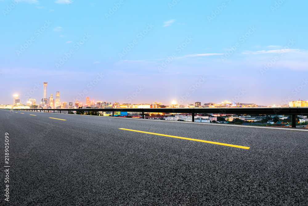 Fototapeta premium Panoramic beijing skyline and buildings with empty road