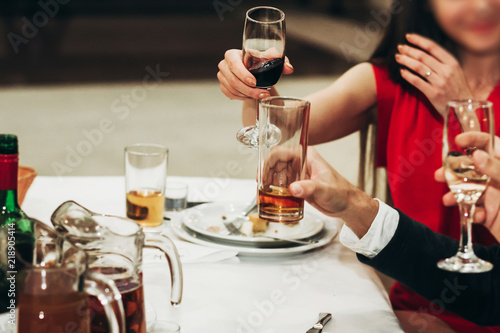 Canvas Print Corporate business man toasting at dinner party table hands close-up, wedding re