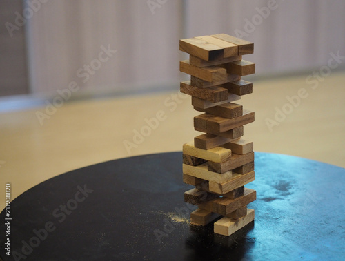 Wooded blocks tower stack game. photo