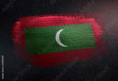Maldives Flag Made of Metallic Brush Paint on Grunge Dark Wall