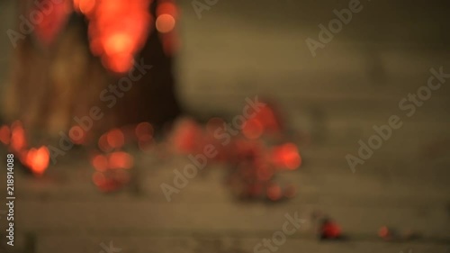 Burning wood with flames and glowing heat at night in the city 