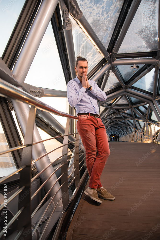 man standing in a corridor man standing in a corridor