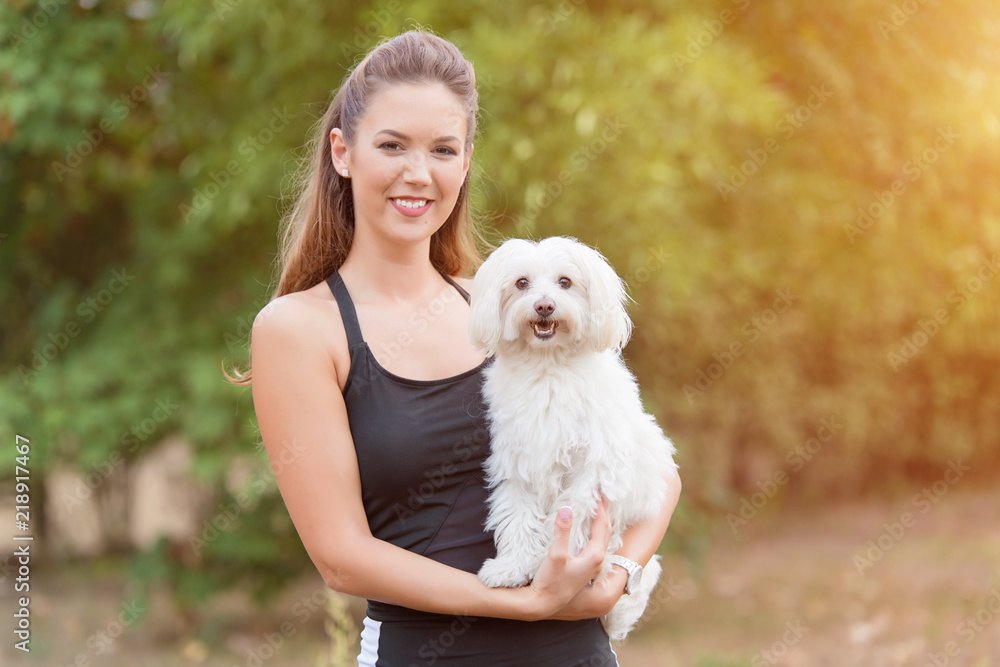 Bichon bolognese dog with beautiful in the park Bichon bolognese dog with beautiful in the park