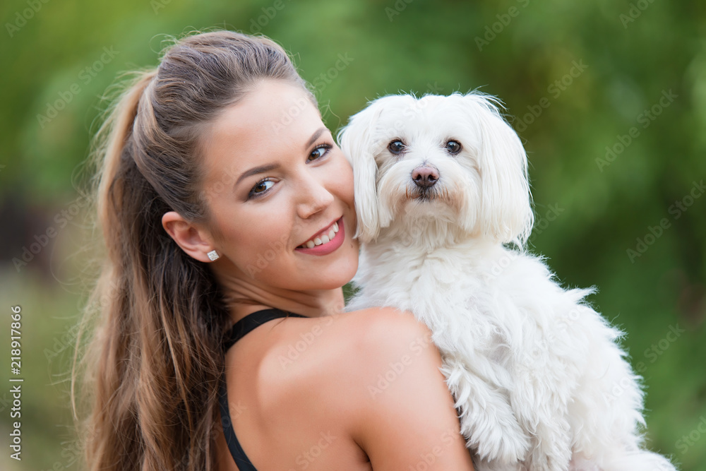Bichon bolognese dog with beautiful in the park Bichon bolognese dog with beautiful in the park
