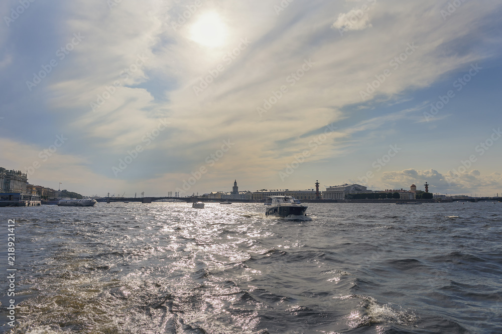 view of the Neva River in St. Petersburg with a tourist ship in the background