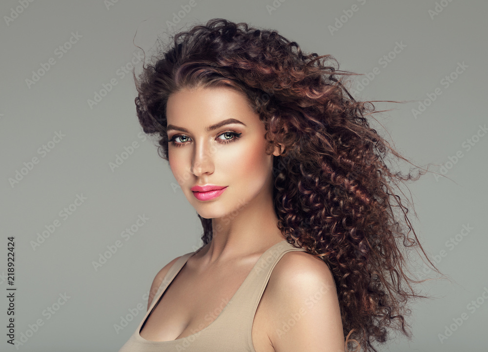 Beautiful hair long curly hairstyle woman with beauty makeup female model portrait - obrazy, fototapety, plakaty 