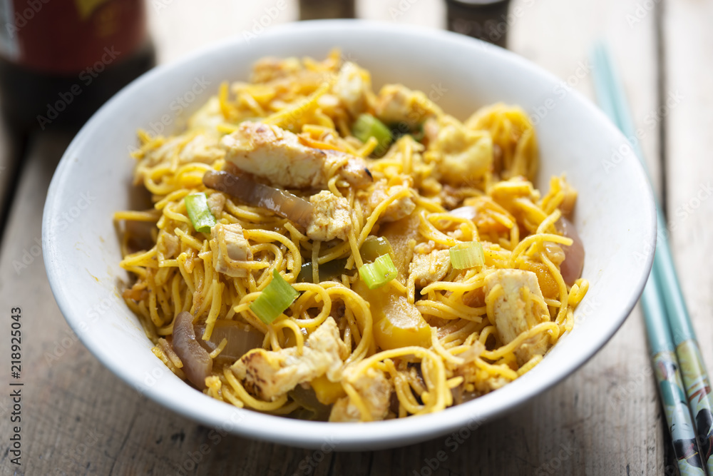 Singapore noodles, stir-fried noodles, chicken breast with egg, mixed greens in curry sauce Singapore noodles, stir-fried noodles, chicken breast with egg, mixed greens in curry sauce