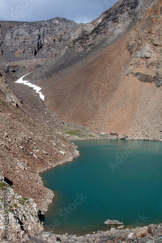 Blue lake in the Altai Mountains. Glacier Aktru. Pass Aktru