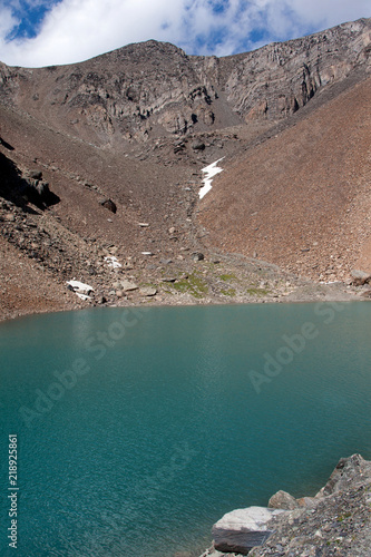 Blue lake in the Altai Mountains. Glacier Aktru. Pass Aktru