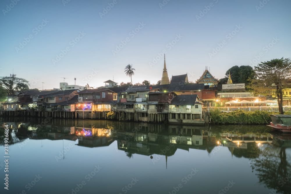 Fototapeta premium CHANTHABURI, THAILAND - August 21, 2018 : The old waterfront community. Chanthaburi Old Town Waterfront, Landmark with old building village in Chanthaburi Thailand.