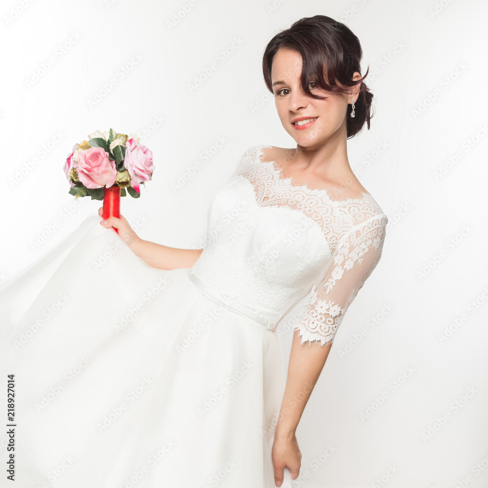 elegant bride with beautiful wedding bouquet in a hands. wedding make-up and hairstyle concept elegant bride with beautiful wedding bouquet in a hands. wedding make-up and hairstyle concept